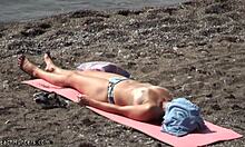 Dirty Pervert Spies on Half-Naked Tanned Babe Sunbathing on Beach