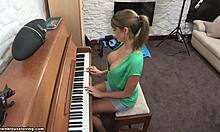 Blonde teacher flashes big natural tits while playing piano