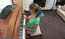 Blonde teacher flashes big natural tits while playing piano
