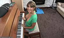 Blonde teacher flashes big natural tits while playing piano