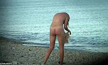 Perky ass brunette flashes her tits and pussy on the beach for hidden cam voyeurs.