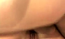 Hungry milf deepthroats and jerks man's huge cock passionately.