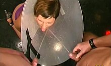 Inventive slut wears special collar for man's piss punishment, on her knees with blowjob