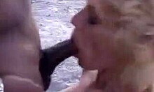 Blonde With Fake Tits Deepthroats Big Black Cock