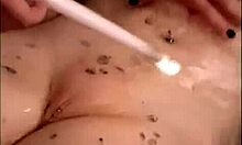 Frightened Redhead Lying In Bath Getting Nipples Tortured