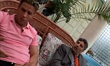 Stunning tanned babe in sexy bikini blows her man near the pool on her knees