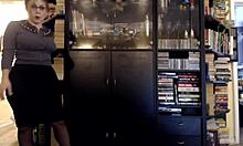 Look At This Busty Milf Getting Naked In The Library And Masturbating With Dildo