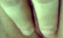 Hey, check this bombshell brunette on all fours fingering herself deep.