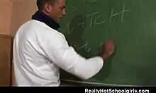 teacher in glasses teaches handsome student lesson