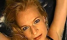 Guy splashing water on blonde's eyes