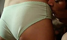 Playful redhead undresses for intense boob kissing