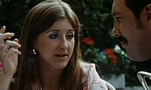 Hot brunette babe sits nude on boyfriend's lap