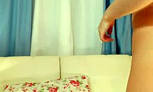 young blonde fucks herself with dildo in bedroom, shaved pussy wet