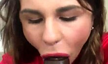 Crystina Rossi Poses in Lingerie While Practicing Blowjob Skills on a Big Black Cock Toy.