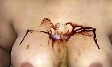 Crystina Rossi covers big naturals in chocolate