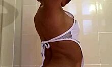 Wildly erotic brunette showers her stunning sexy body in the bathroom.