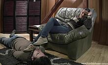 Blonde in sexy sneakers humiliates guy with footjob.