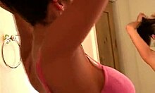 This bombshell babe is posing and seducing by LICKING her HARD NIPPLE