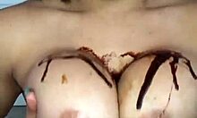 Crystina Rossi covers big naturals in chocolate