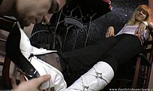 white boots babe dominates with her feet, getting them licked and kissed on camera in a footjob scene