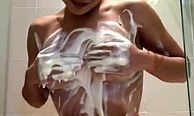 Wildly erotic brunette showers her stunning sexy body in the bathroom.