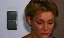 Hey, wanna see this tanned redhead take two huge cocks in a garage threesome?