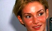 Hey, wanna see this tanned redhead take two huge cocks in a garage threesome?