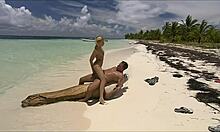 Check out this tanned blonde riding a massive cock on the beach!