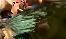 Underwater Hardcore Sparks a Wild FFM Threesome on Wet Sand.