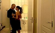 Ponytailed Brunette in Heels Gets a Rough Encounter in the Bathroom