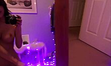 Dark-Haired Girlfriend Performs A Sensual Striptease In Lingerie, Fingering Herself In A Dimly Lit Room.