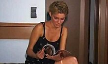 Hey, wanna see this tanned redhead take two huge cocks in a garage threesome?