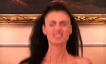 dress-wearing brunette bombshell in stockings enjoying interracial