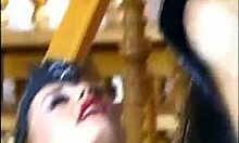 latex brunette in threesome video