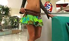 the shades-wearing horny hottie sucks dick and rides it like a total slut, with anal fingering under her skirt.