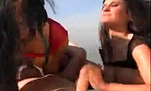Two busty girlfriends give blowjob and ride cock outdoors