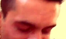 Two Guys Interact With A Blonde Woman In The Bathroom.