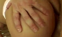 Dark-haired and busty bombshell getting gang-banged by hung studs