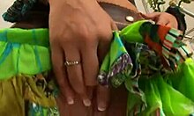 the shades-wearing horny hottie sucks dick and rides it like a total slut, with anal fingering under her skirt.