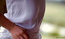 Blond-haired girlfriend in white get-up EXPOSING herself outdoors