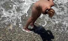 Blond-Haired Bombshell Shows Naked Body On Rocky Beach