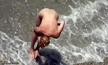Blond-Haired Bombshell Shows Naked Body On Rocky Beach