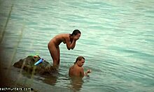 Two nudist girlfriends caught skinny dipping in a hidden spot. So carefree!
