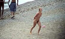 Blond beauty boldly flaunts her sexy hairy body by the shore.