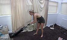 Blonde housewife cleans floor exposing her big boobs