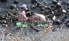 Horny dude takes charge with his girlfriend on a nudist beach setting