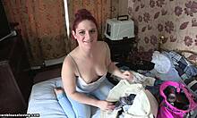 look at my redheaded gf showing off her hot breasts while packing