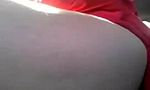 Short-Haired Brunette Posing In Car With Toys