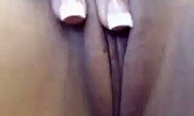 look at this latina teasing her pussy in the cafe