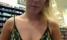 Plump blonde masturbates on webcam in public spot